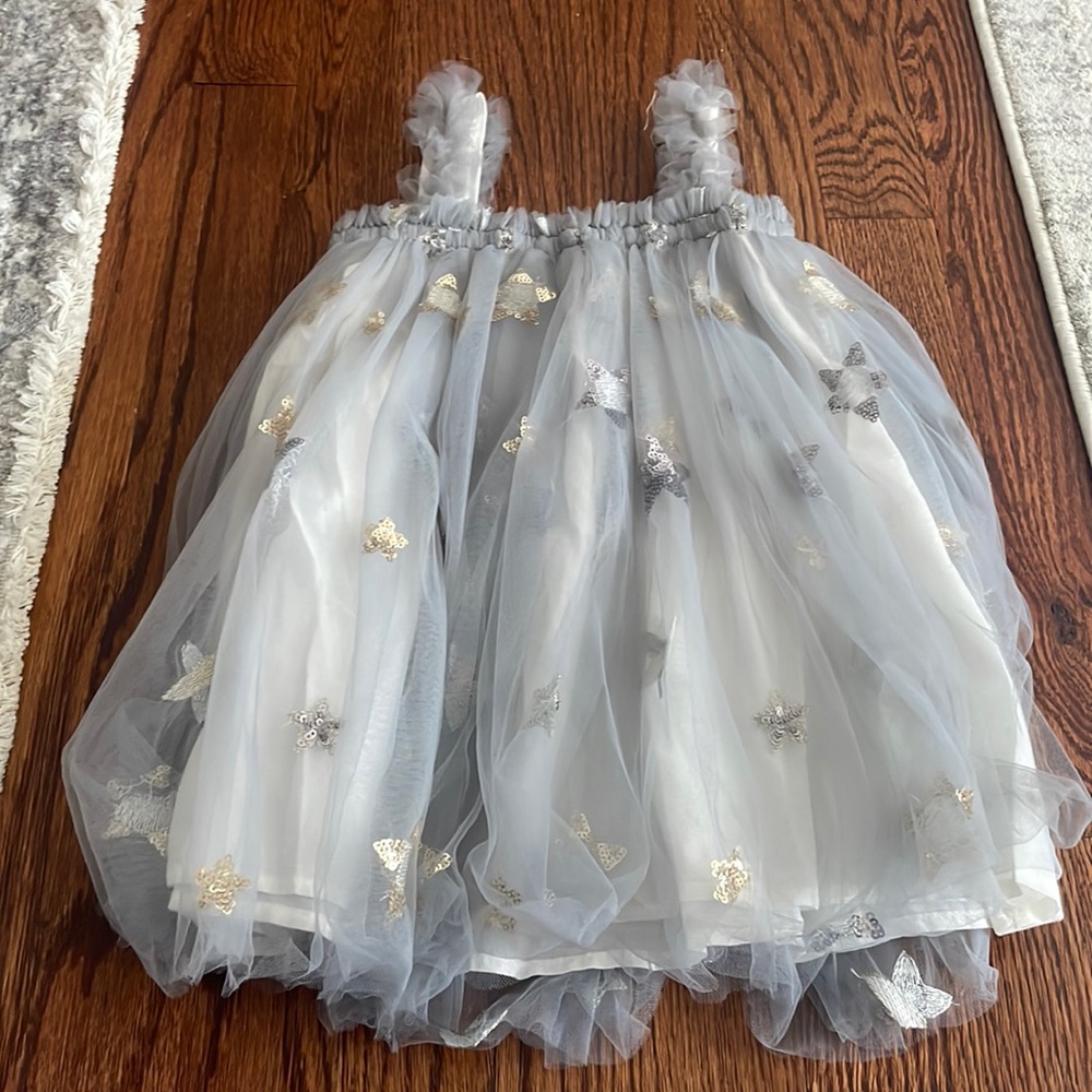 This is a beautiful gray dress with silver stars.